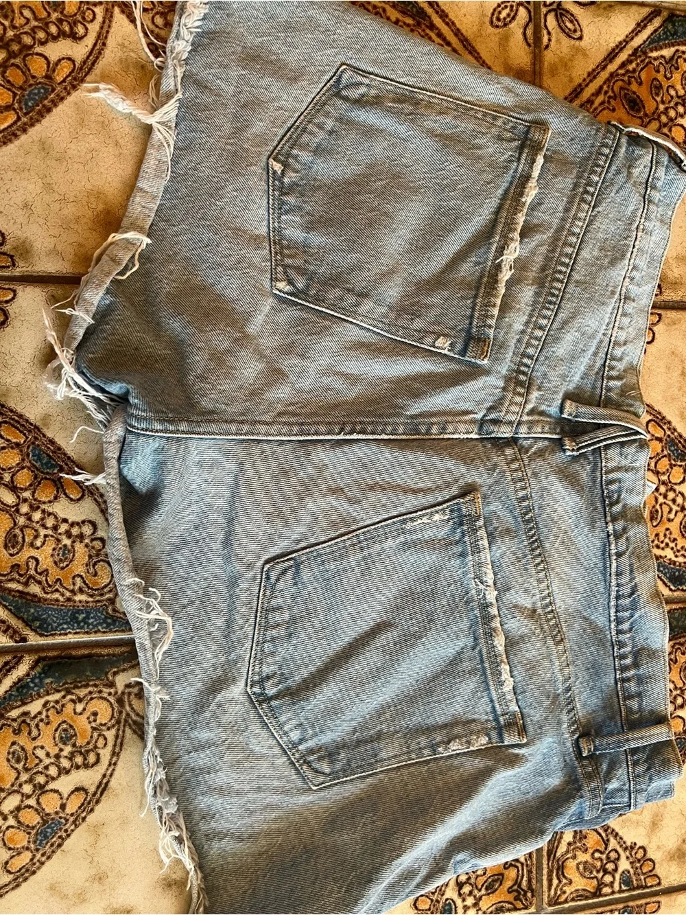 Good American daisy dukes High-Rise Light Wash Denim Cutoff Shorts - Light Blue